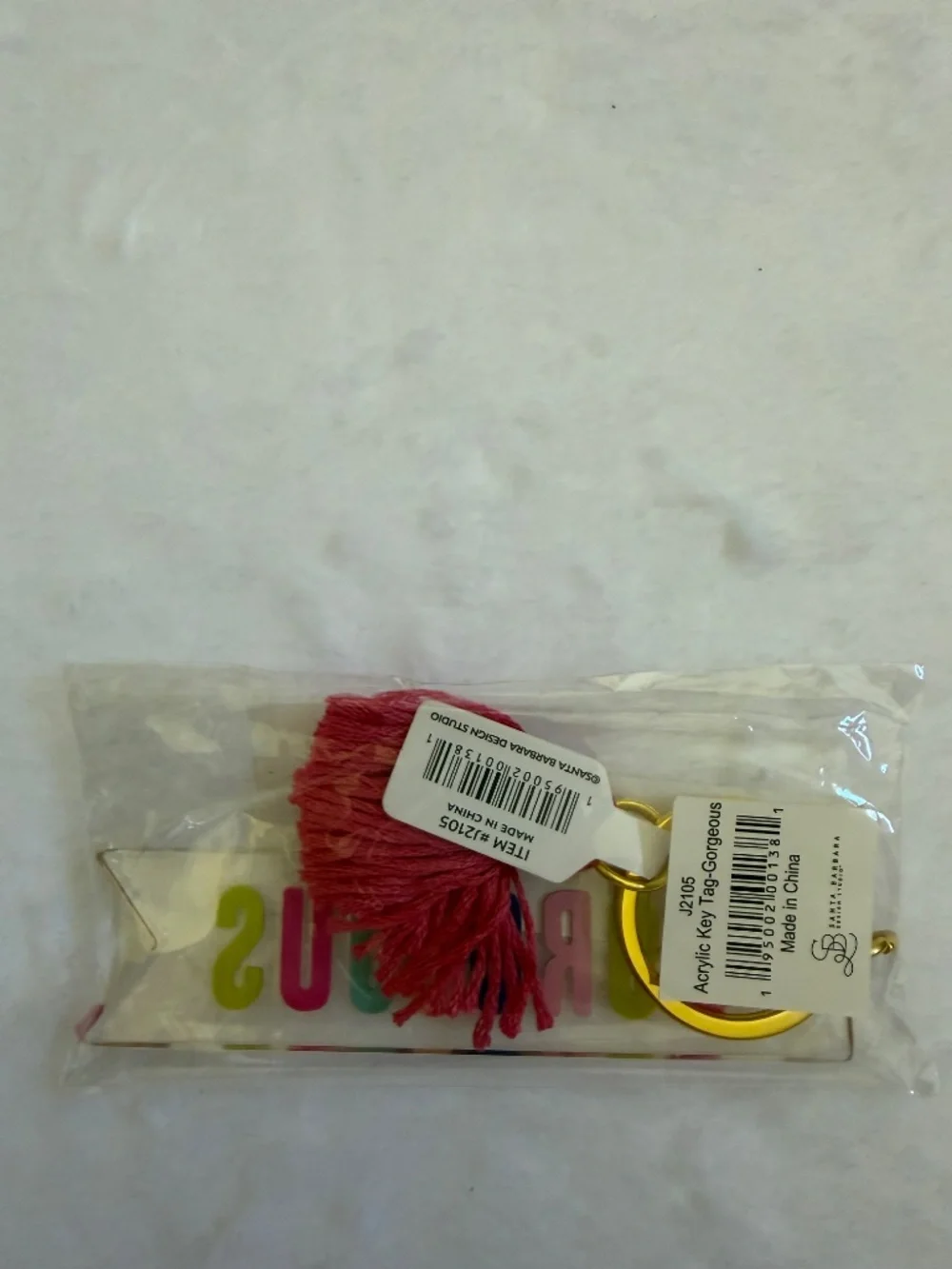 Santa Barbara Design Studio “Gorgeous” Acrylic Multicolor Keychain Pink Tassel